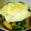 Polenta fries topped with fried egg